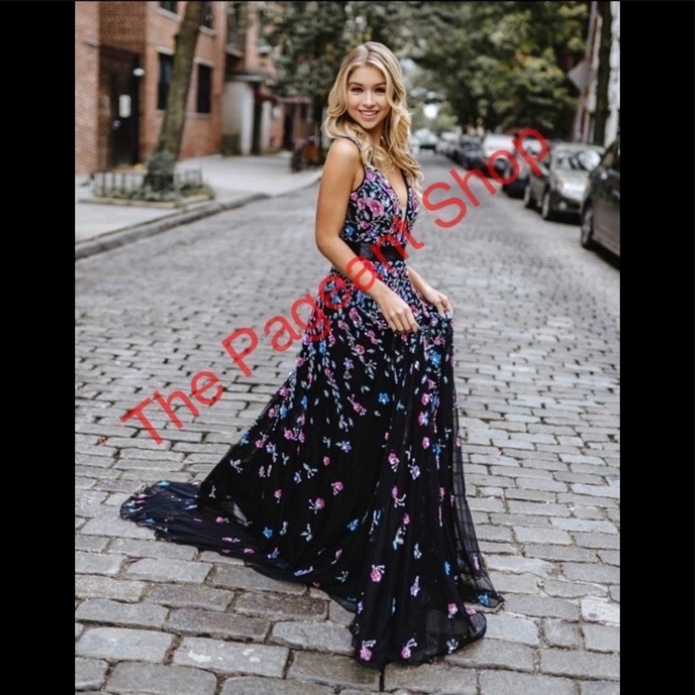 Black floral prom or pageant dress. This is a lovely, elegant black dress! NWT